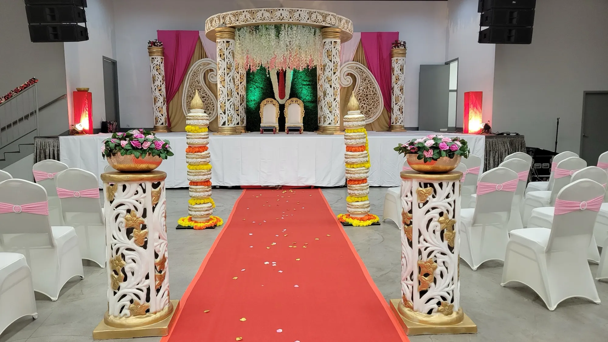 Mandap angle view chairs table — Pink Wisteria Mandap