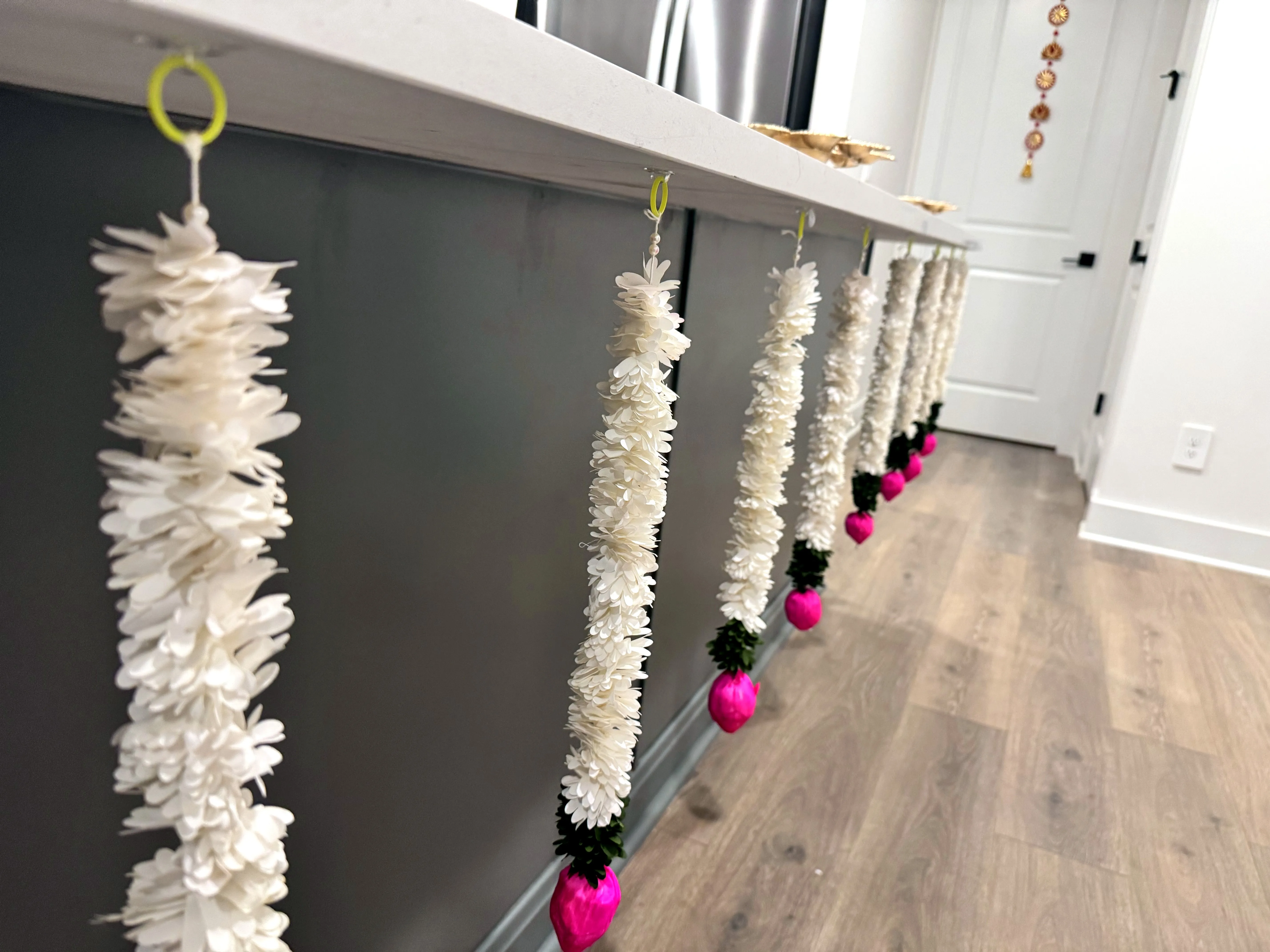 Floral garland detail — Griha Pravesh House Warming