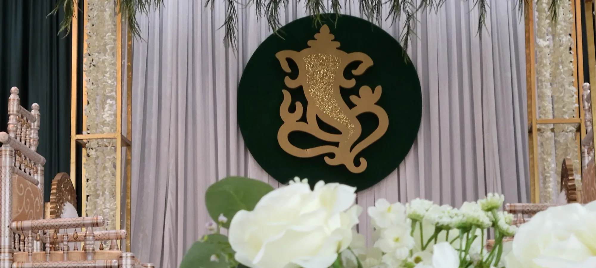 Ganesha medallion drape backdrop — Gold Frame Mandap in Green & White