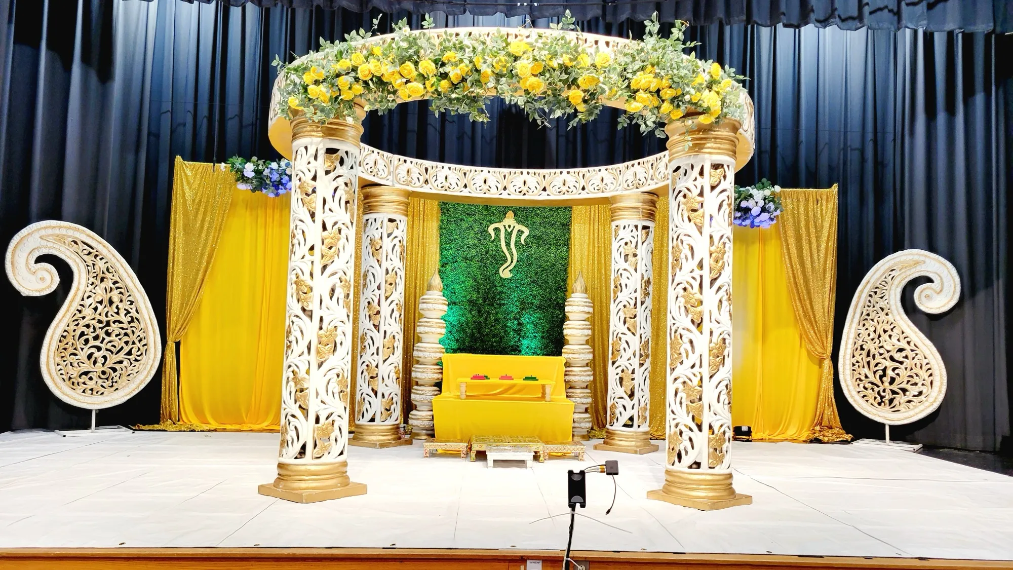 Pillars paisley panels closeup — Yellow & Gold Mandap with Paisley Pillars